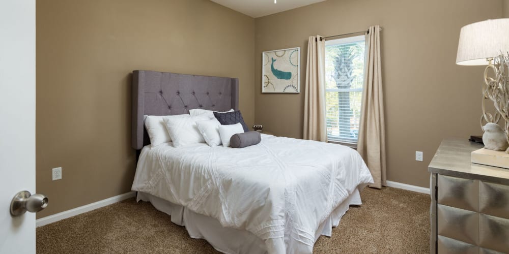 Model apartment bedroom at Channel Family in Hanahan, South Carolina