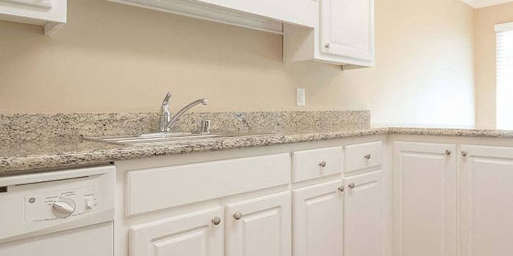 Kitchen with cabinets at The Meridian Apartment Homes in Walnut Creek, California