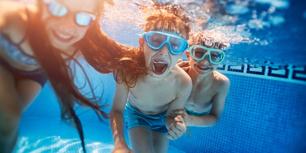Kids swimming in a pool at Espana East in Sacramento, California