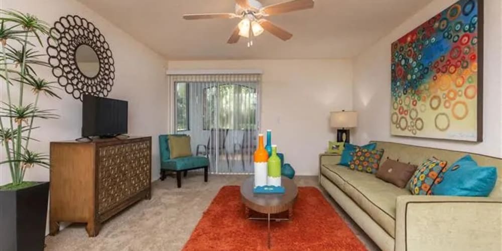 A furnished apartment living room at The Granite at Porpoise Bay in Daytona Beach, Florida