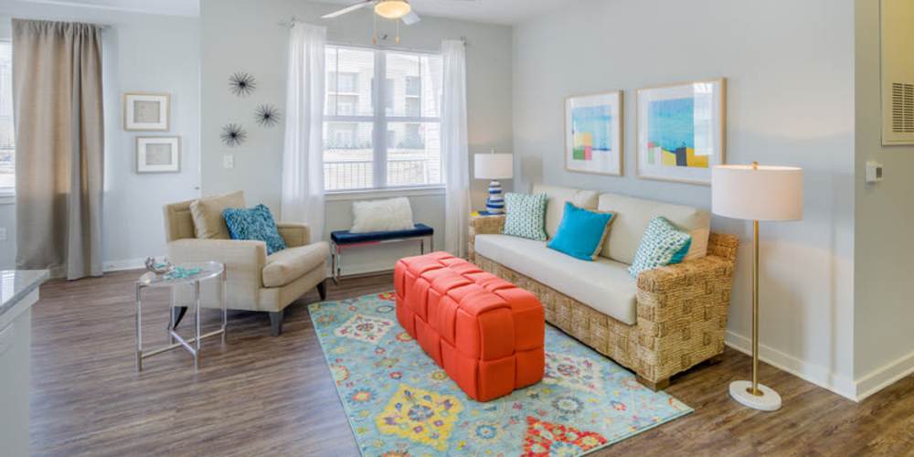 A furnished apartment living room at Reserve at River Place in Youngsville, Louisiana