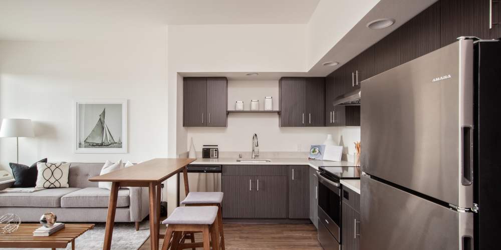 Kitchen with stainless-steel appliances at Green Leaf Uptown in Vancouver, Washington