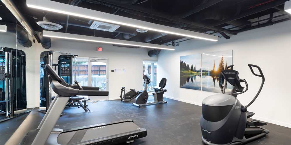 Trendy fitness center with cardio equipment at Green Leaf Encore in Seattle, Washington