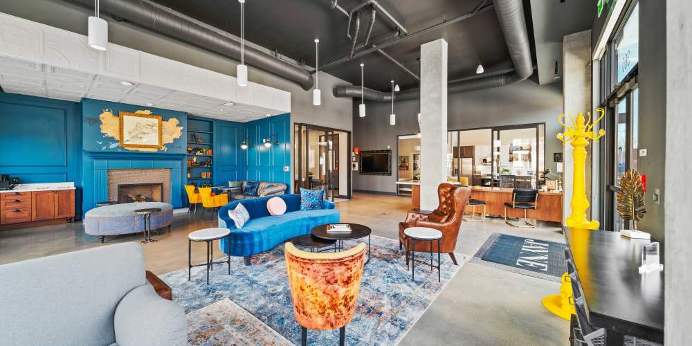 Resident clubhouse with modern seating at Jayne in Denver, Colorado