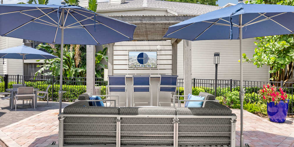 Outdoor seating near the pool at 4800 Westshore in Tampa, Florida