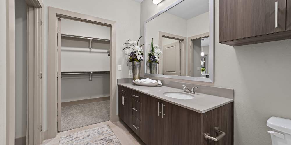 Bathroom with vanity mirror  at Harbor Hill in Rockwall, Texas