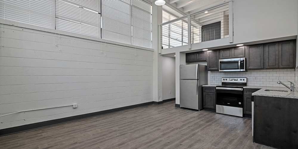 Loft with tall ceilings at The Lofts at the Municipal in Lafayette, Louisiana