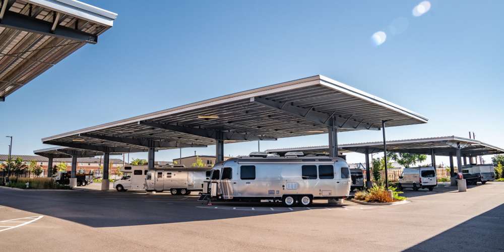 Covered RVs stored at StorQuest RV & Boat Storage in Littleton, Colorado