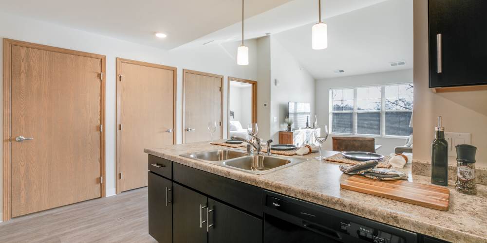 Modern kitchen with granite countertops at Whitetail Ridge in Salem, Wisconsin