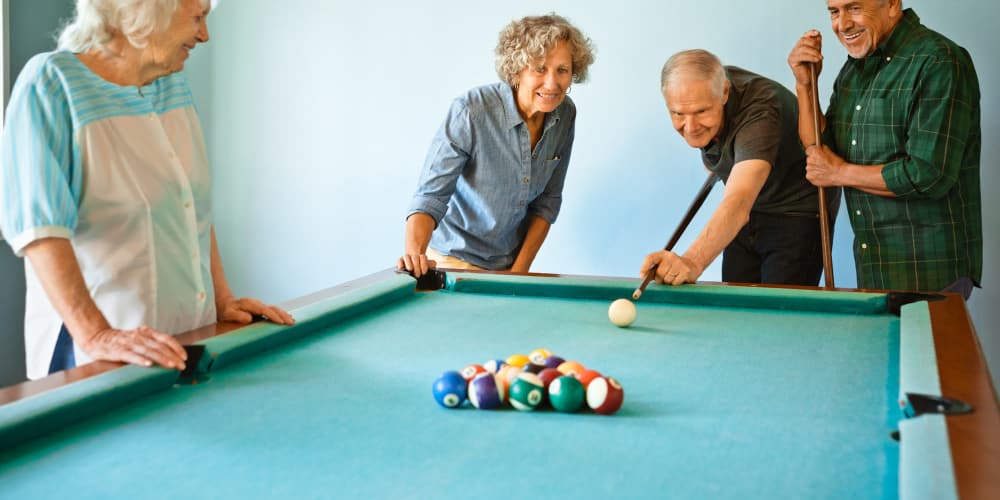 Residents playing pool near Eva Manor in Pleasant Prairie, Wisconsin