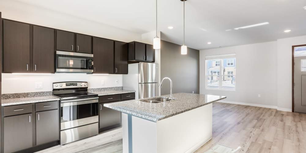 Kitchen with steel appliance at Union Court Senior Apartments and Townhomes in Kenosha, Wisconsin 