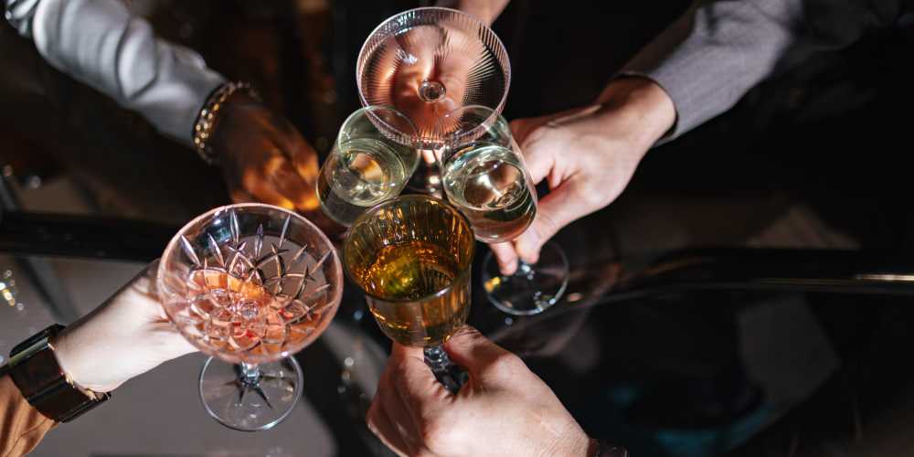 A group of friends toasting glasses near Clear Creek Crossing in Wheat Ridge,Colorado