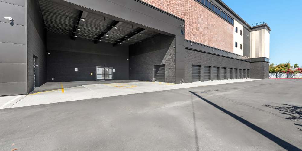 Drive-up storage and a large loading bay at StorQuest Self Storage in El Cajon, California