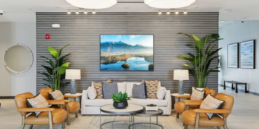 Clubhouse with large television at The Breeze in Winter Haven, Florida