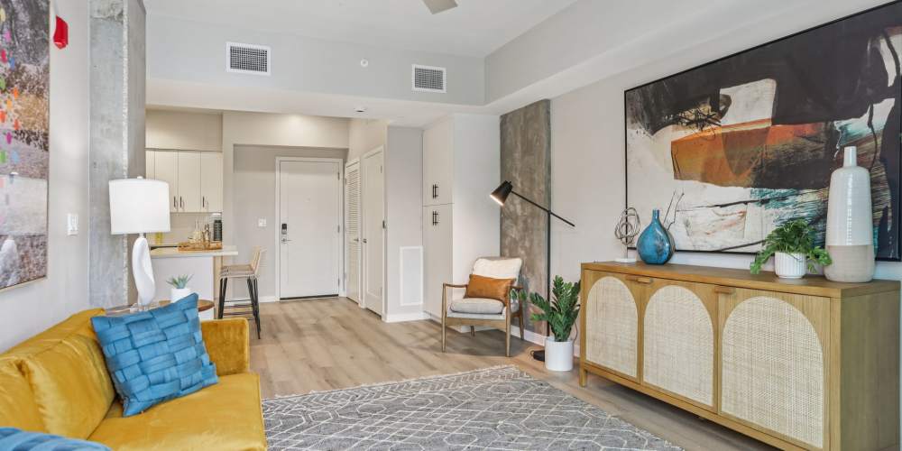 Living room with wooden flooring at The Breeze in Winter Haven, Florida