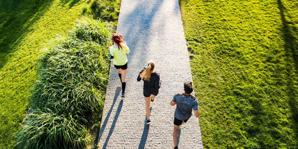 Residents jogging on outdoor path at Fairways on Green Valley in Henderson, Nevada
