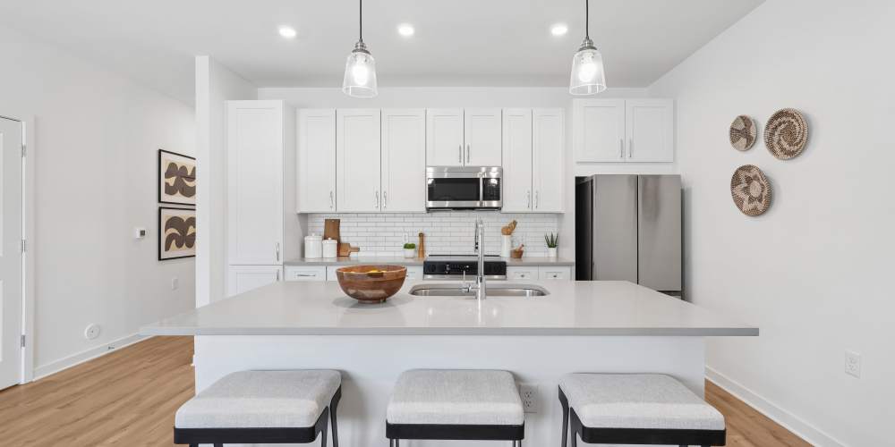 brand new homes for rent near me chesterfield virginia richmond Kitchen with stainless steel appliances large island at Hamlet Falling Creek in Midlothian, Virginia