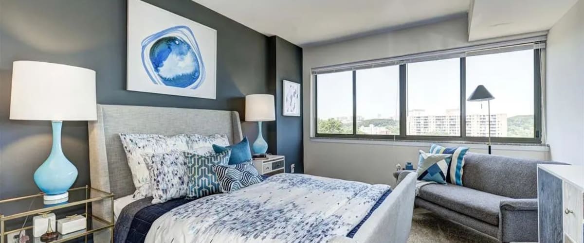 Chic model bedroom with great natural light at The Mark by Solaire in Alexandria, Virginia