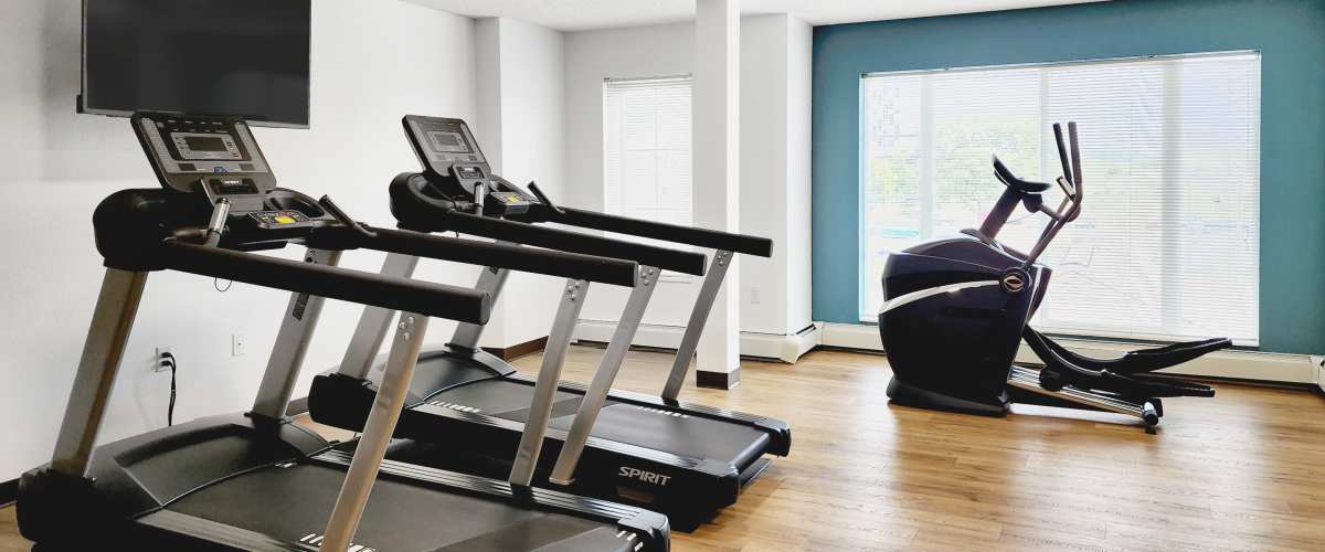 Fitness center cardio equipments at Parkway Gardens Senior Apartment Community in Saint Paul, Minnesota