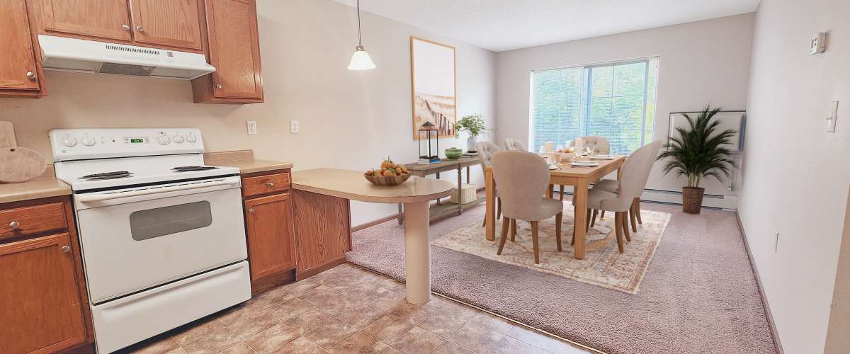 Apartment Kitchen and dining room at Parkway Gardens Senior Apartment Community in Saint Paul, Minnesota