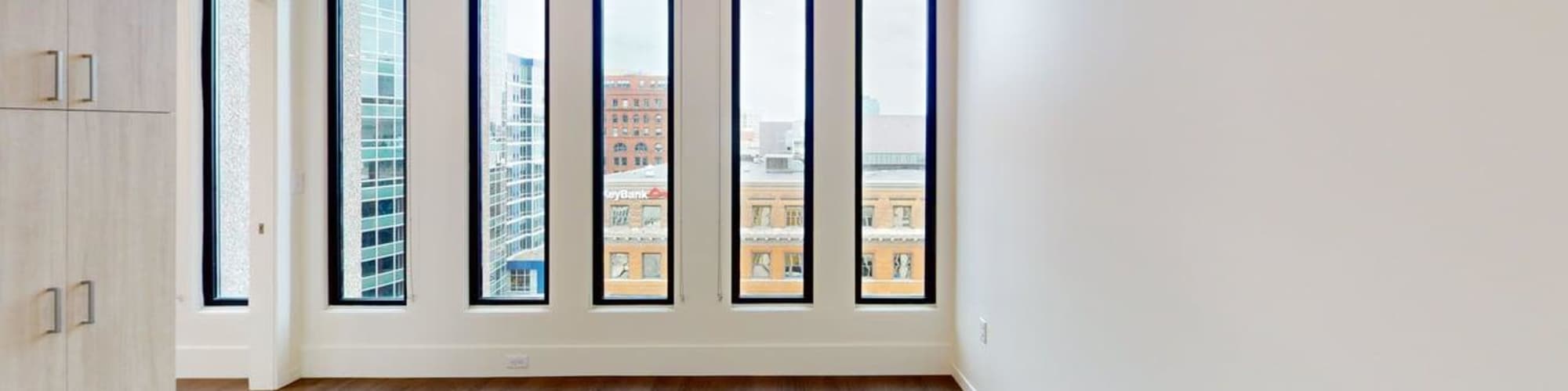 Empty space with large windows at Residences at 111 Lyon in Grand Rapids, Michigan