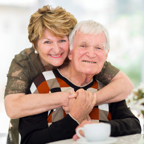 Smiling couple at Wyndham Court of Plano in Plano, Texas