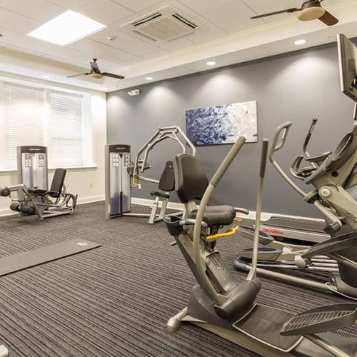 Cardio machines and weights in the high-tech fitness center at Ethan Pointe Apartments in Rochester, New York