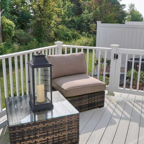 Outdoor lounge area at The Links at CenterPointe Townhomes in Canandaigua, New York