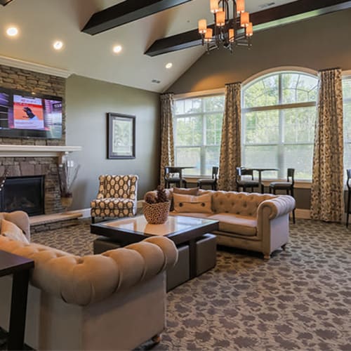Fireside lounge at Auburn Creek Apartments in Victor, New York