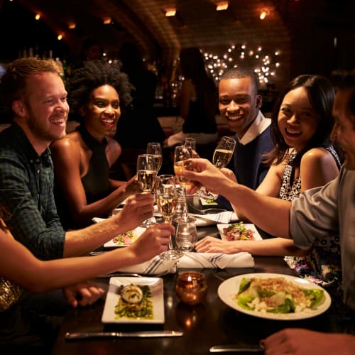 Resident couples out for a night on the town enjoying dinner and drinks near Reserve at Peachtree Corners in Norcross, Georgia