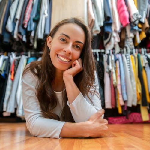Resident enjoying the walk-in closet in her new home at 860 South in Stockbridge, Georgia