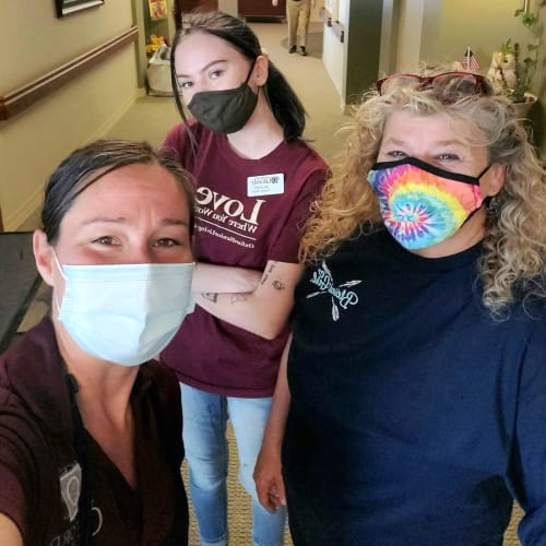 Three team members at The Oxford Grand Assisted Living & Memory Care in Kansas City, Missouri