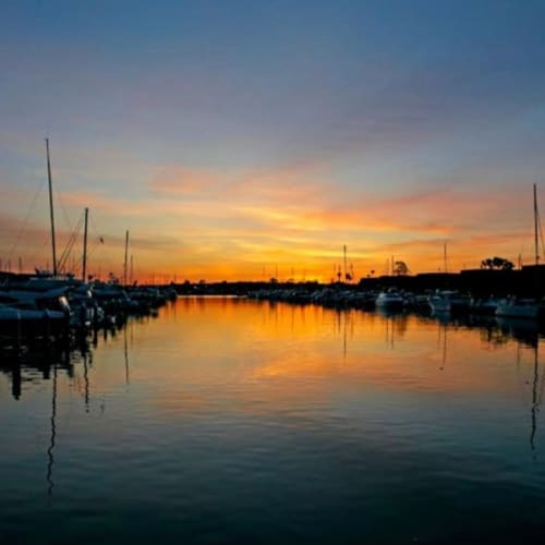 Sunset view of the marina at Marina Harbor in Marina del Rey, California