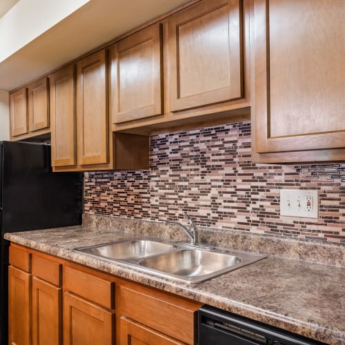 Lots of cabinets in a kitchen at Thirty43 by the Greene in Kettering, Ohio