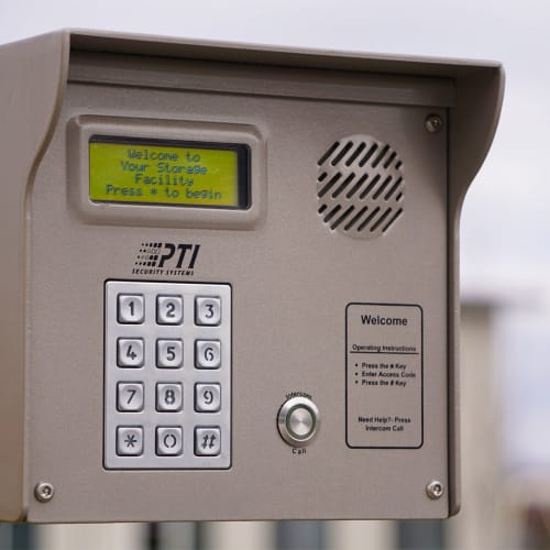 A keypad to open the gate at the entryway of Red Dot Storage in Jeffersonville, Indiana