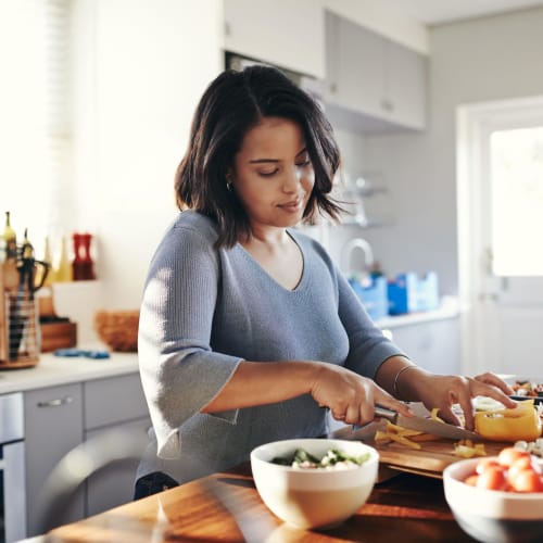 Resident making breakfast at Laurel Ridge in Northampton, Massachusetts