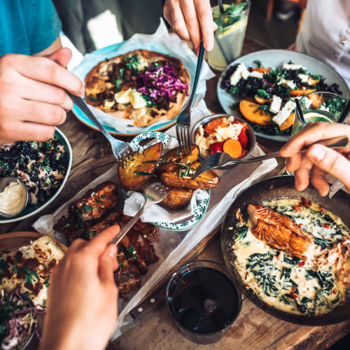 Residents enjoying food in Amherst, Massachusetts near Hawkins Meadow