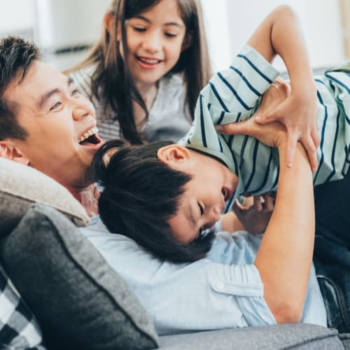 Resident hanging out with his kids at Park Edge Apartments in Springfield, Massachusetts 