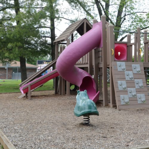 A large children's playground with a slide at Northgate Meadows Apartments in Cincinnati, Ohio