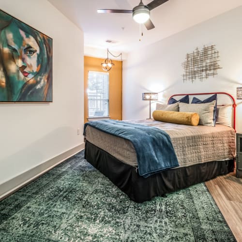 Cozy primary bedroom at Skyline West in Atlanta, Georgia