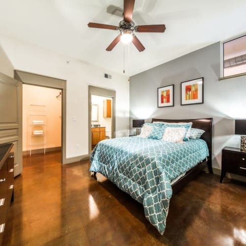 Cozy primary bedroom at Marquis Lofts on Sabine in Houston, Texas