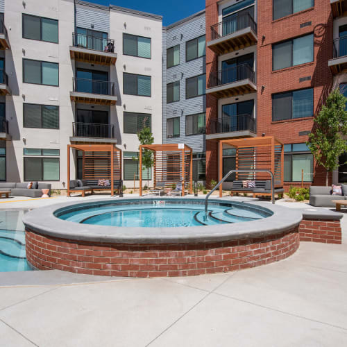 Hot tub by the pool at Marq Iliff Station in Aurora, Colorado