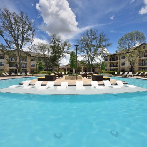 Spa and swimming pool area at Olympus Falcon Landing in Katy, Texas