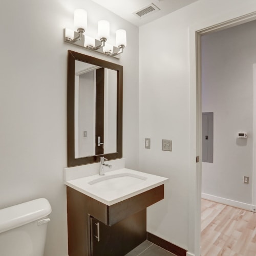 Well lit bathroom area with nice mirror cabinets at 1350 Florida in Washington, District of Columbia