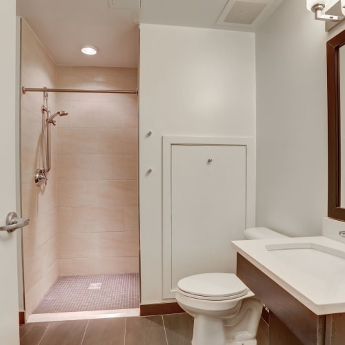 Full bathroom with shower and white sink at 1350 Florida in Washington, District of Columbia