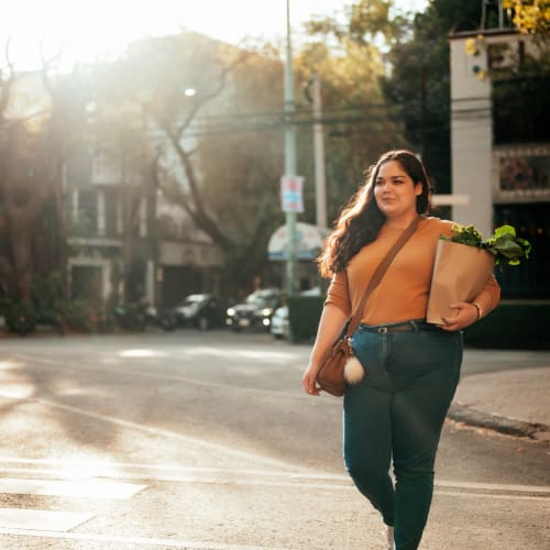 Resident coming home from a quick trip to the grocery store near 700 Constitution in Washington, District of Columbia