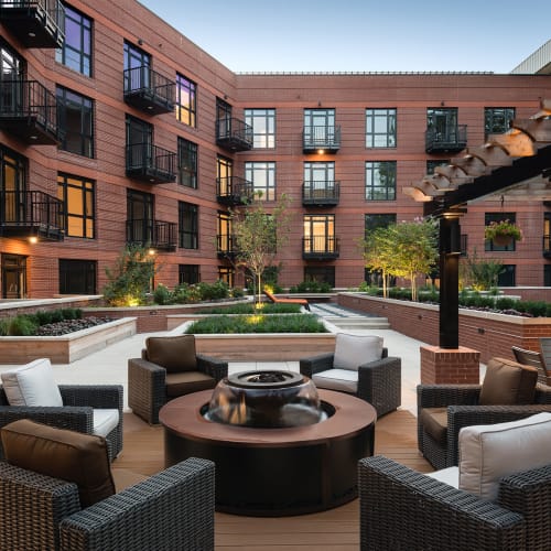 Incredibly courtyard firepit where residents can stay warm on cool nights with friends at 700 Constitution in Washington, District of Columbia