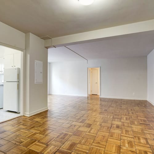 Spacious open living area in an empty home at Dorchester House in Washington, District of Columbia