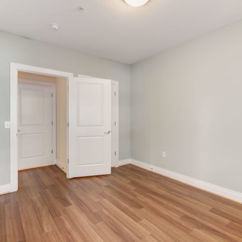 Lots of closet space and nice wood style flooring in an unfurnished home at Dorchester West in Washington, District of Columbia
