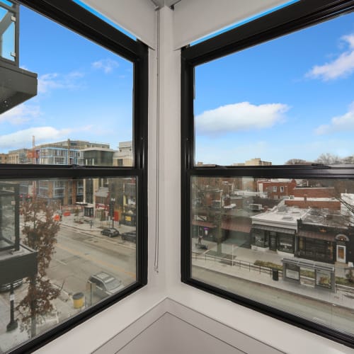 Corner windows in a home with an amazing view at Madrona Apartments in Washington, District of Columbia
